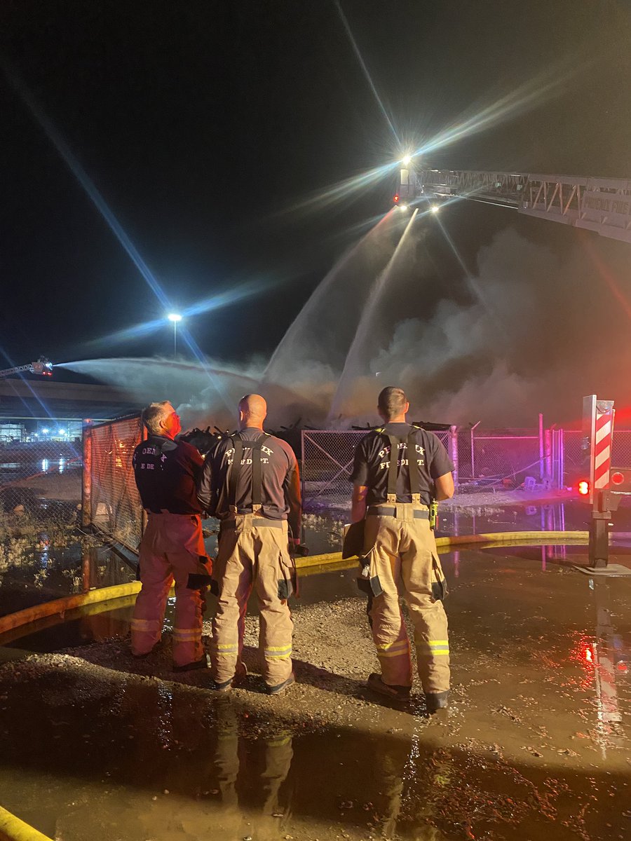 Firefighters battled a 2nd Alarm Hazmat Fire tonight near 19th Ave & McDowell Rd. Crews arrived on the scene and found a large pile of railroad ties fully involved. Ladder companies were set up for a Big Water operation. No reported injuries and the cause is unknown