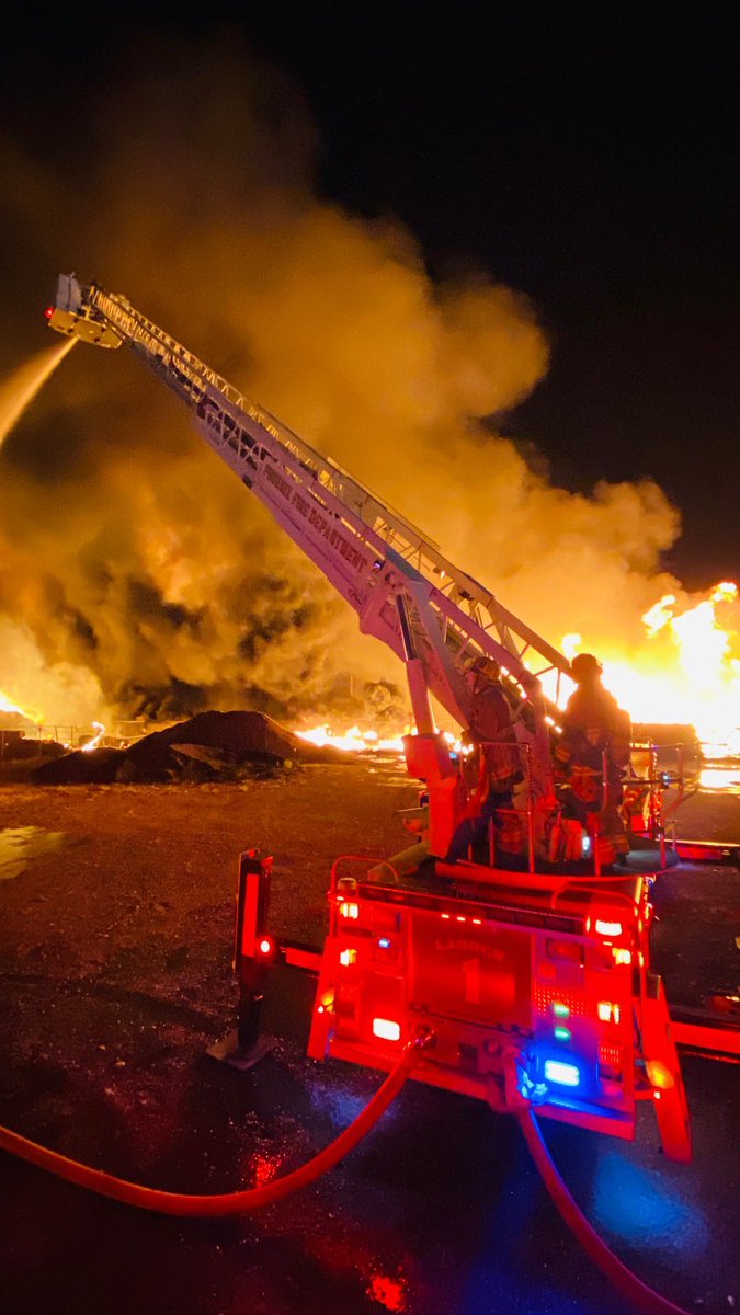 Crews from all over the valley are working a pallet fire along Buckeye and 39th Ave  @PHXFire shared pics of fire fighters battling intense flames. They say wind picked up and spread some flames a quarter mile East. 