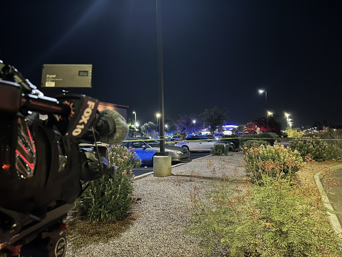 Police activity in the Longhorn Steakhouse parking lot along 75th Ave.No details from Phoenix PD yet but there are officers inspecting a vehicle and police tape sectioning off part of the parking lot where said vehicle is located