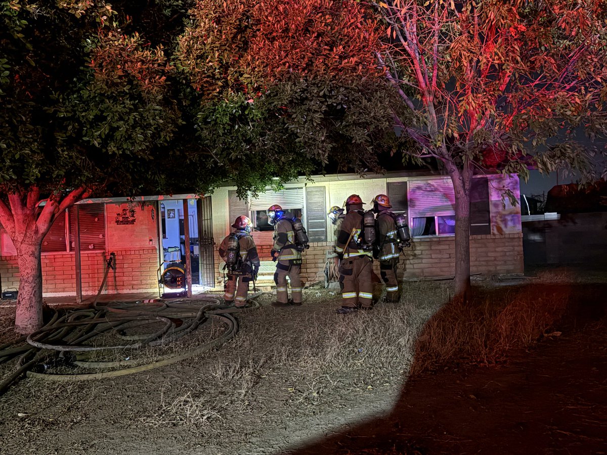 Firefighters have extinguished a house fire near 48th St and Southern Ave. Personnel from the Community Assistance Program are assisting four displaced residents. No injuries have been reported, and the cause is under investigation